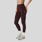 Vuori-WomensAllTheFormPocketLegging-Raisin-CultureAthletics